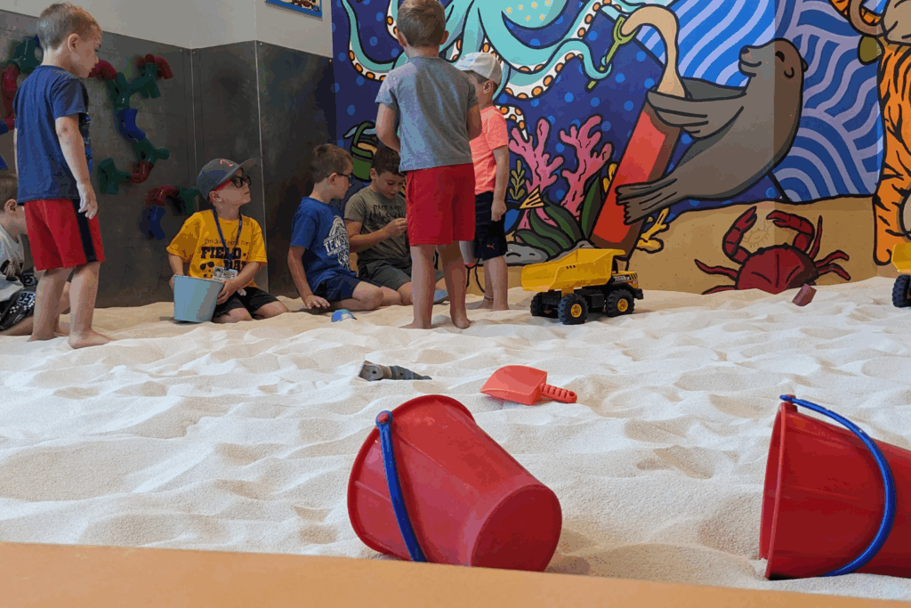 Kids sharing, Negotiating, and Bonding at Sandmagination